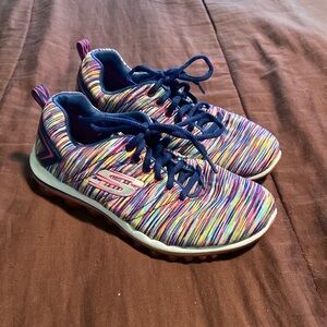 Sneakers by Sketchers Brand.   EUC!